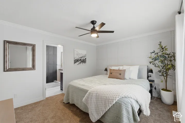 Bedroom featuring decorative accent wall behind the bed.
