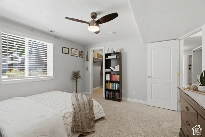 Cozy bedroom with soothing, neutral colors.