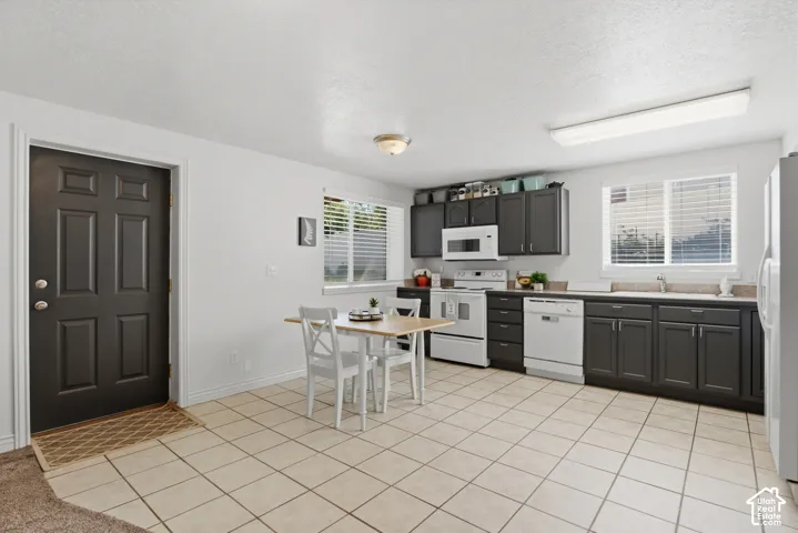 Back door connects to covered backyard patio offering a relaxing space.