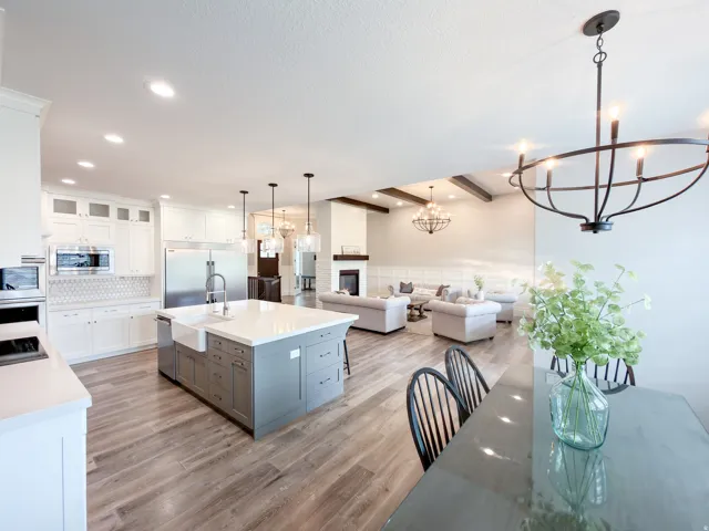 Open-concept interior featuring light wood-finish flooring throughout