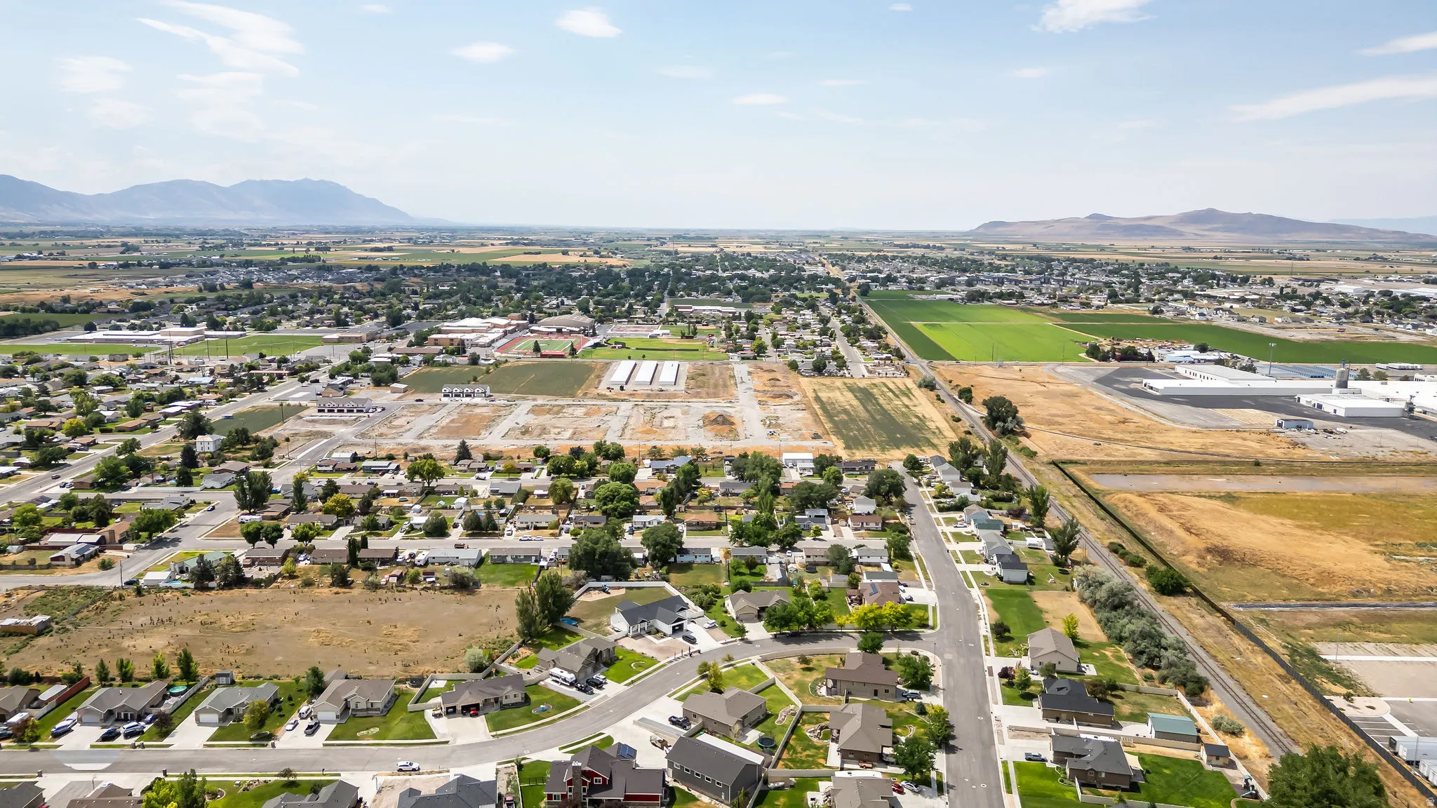 Aerial perspective showcasing a residential area with varied housing styles