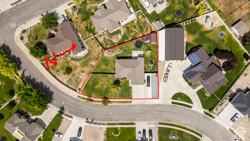 Aerial perspective highlighting a corner lot property