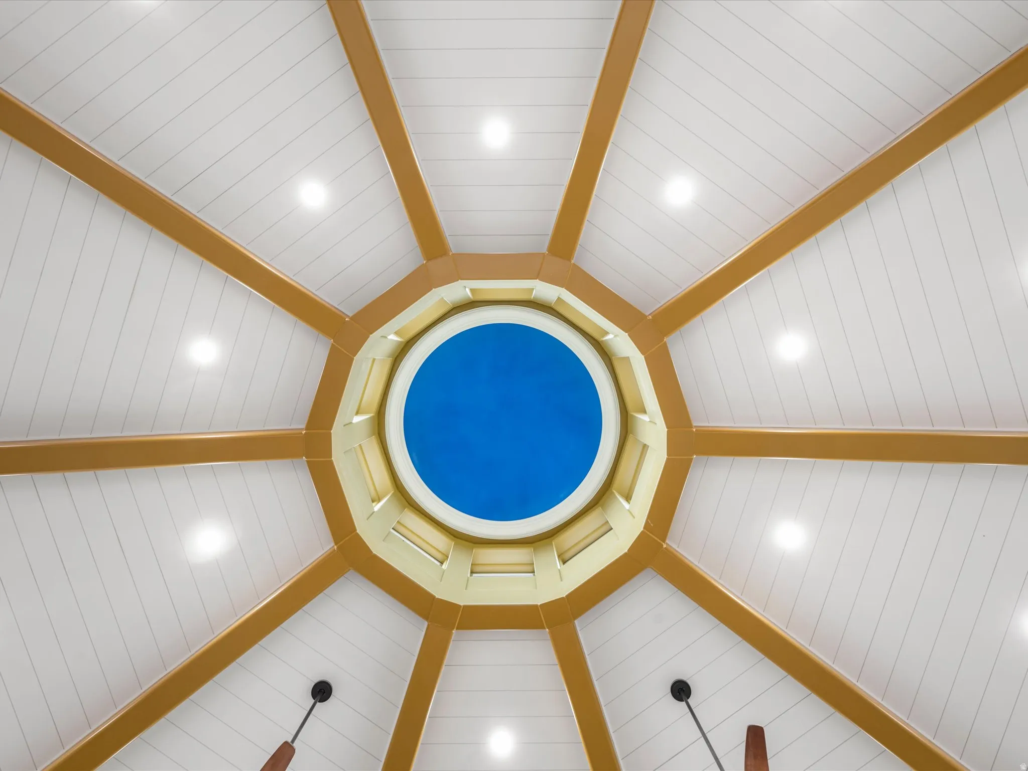 Octagonal ceiling design featuring a central circular skylight