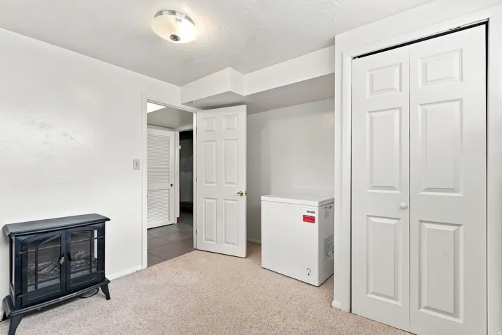 Neutral-toned carpeting complements white walls and trim