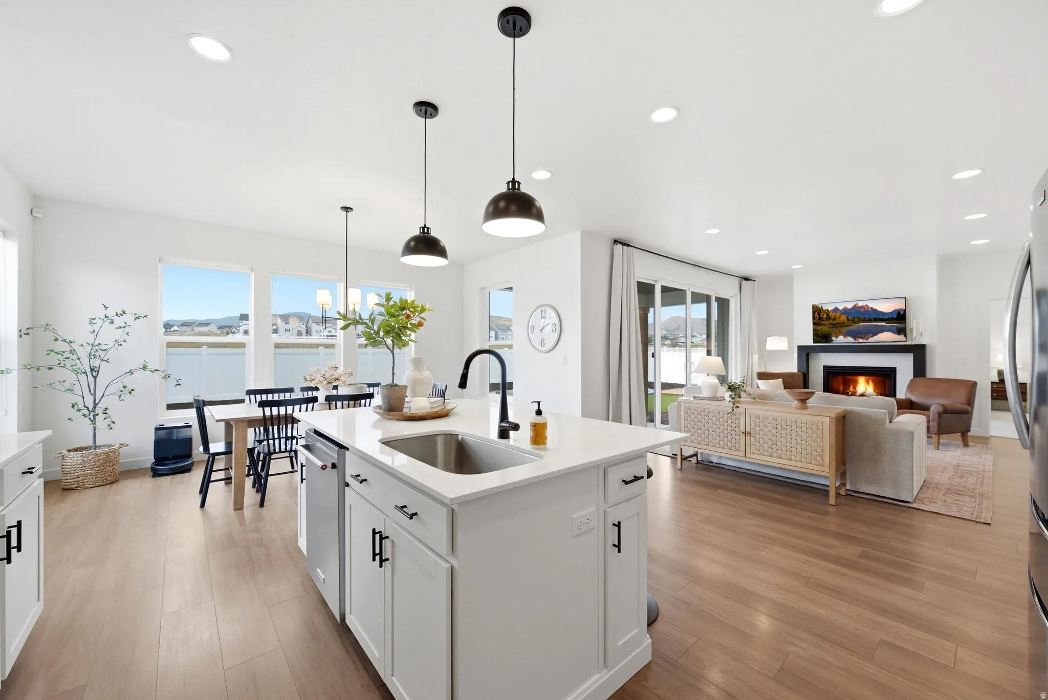 Modern kitchen island with an undermount sink and matte black faucet