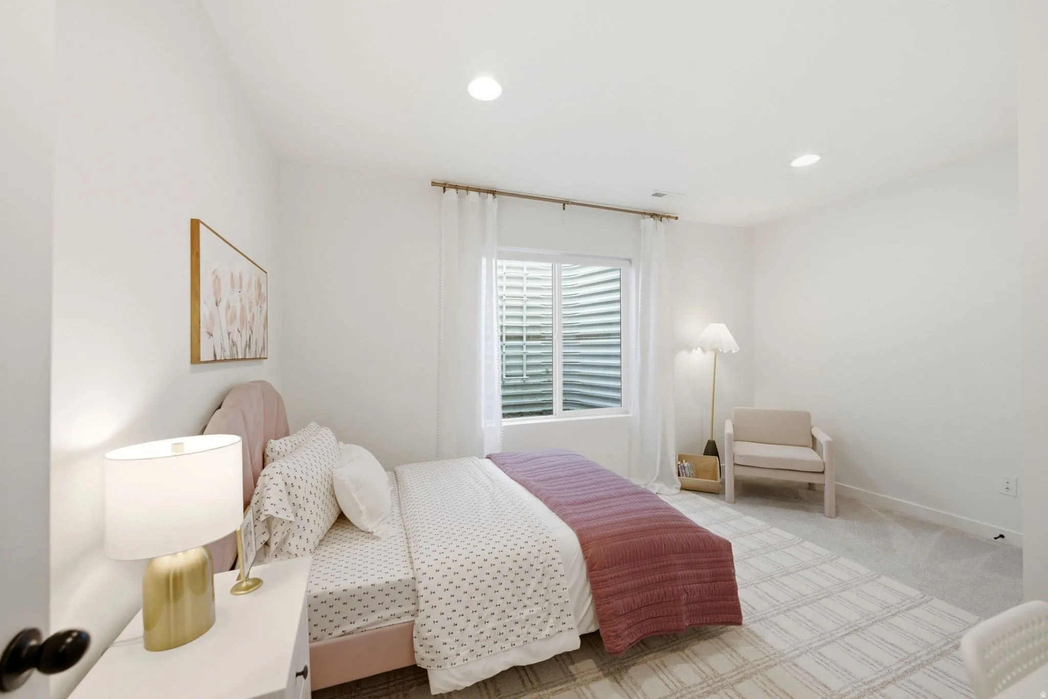 Room featuring recessed lighting, a window with horizontal blinds, and neutral-toned wall-to-wall carpeting