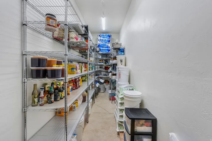Dedicated pantry space featuring extensive wire shelving for comprehensive storage