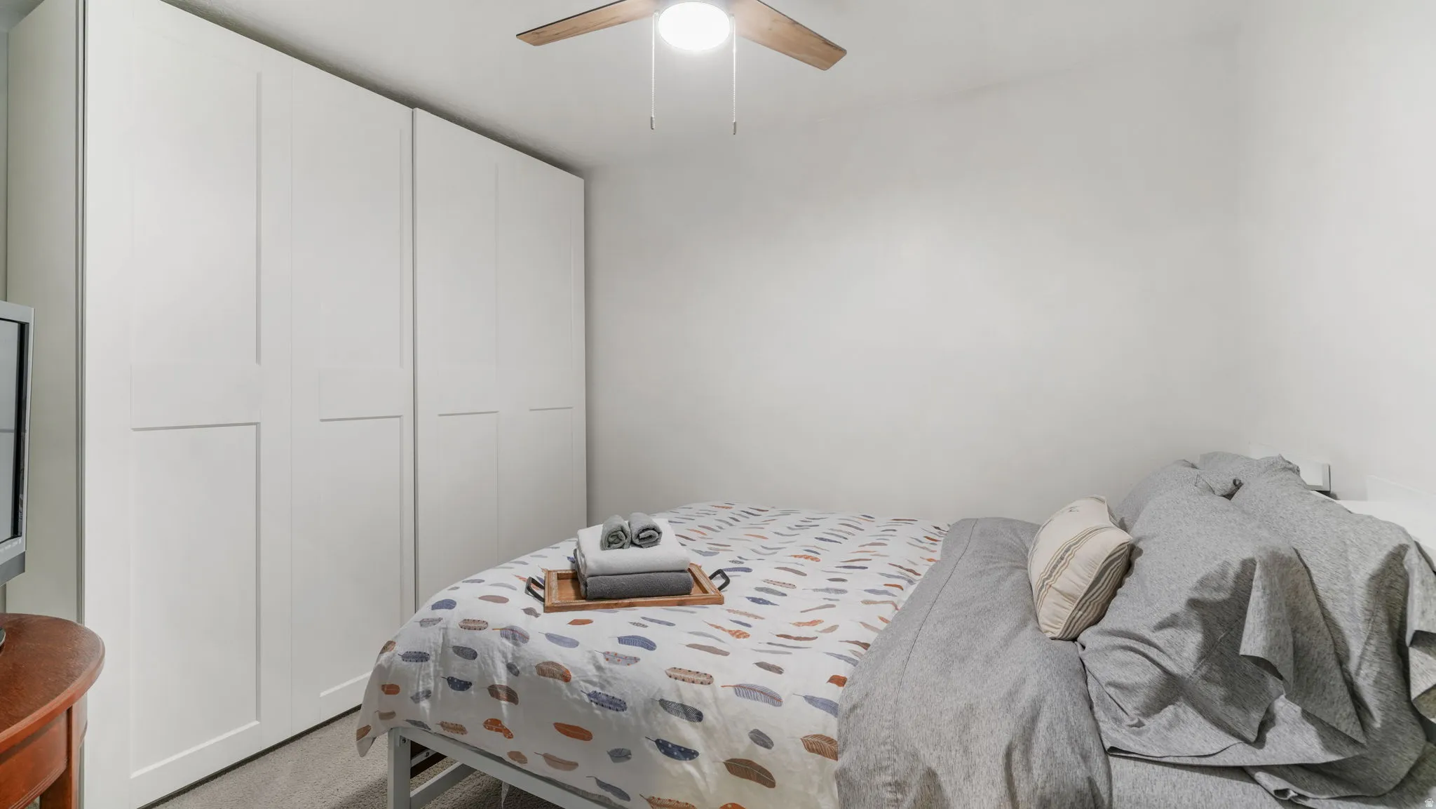 Recessed lighting and ceiling fan overhead