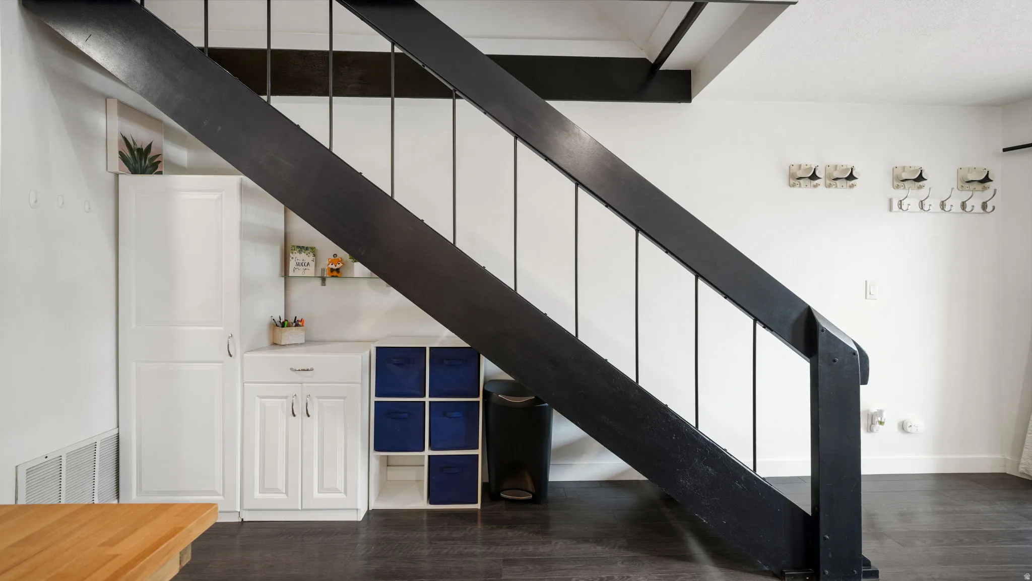 Modern black staircase with contrasting white risers