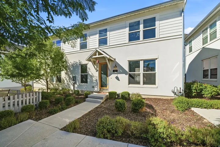 Two-story exterior with horizontal siding and stucco finishes