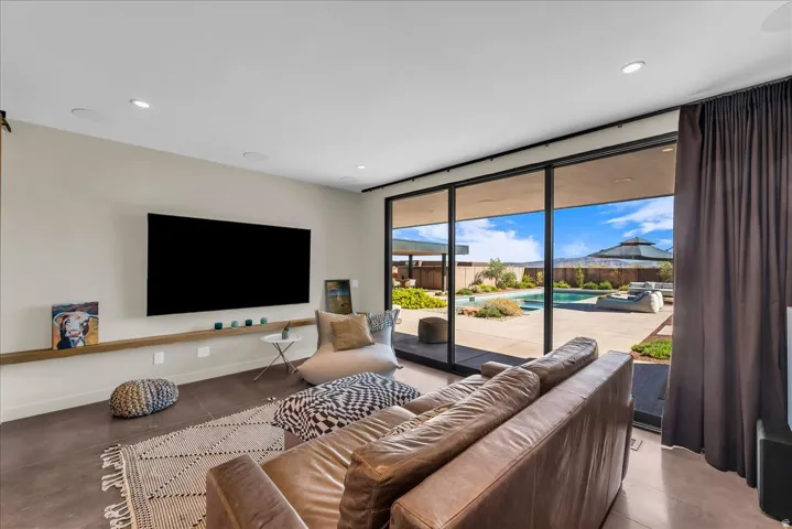 Flex Room with pocket doors leading to the pool and spa area