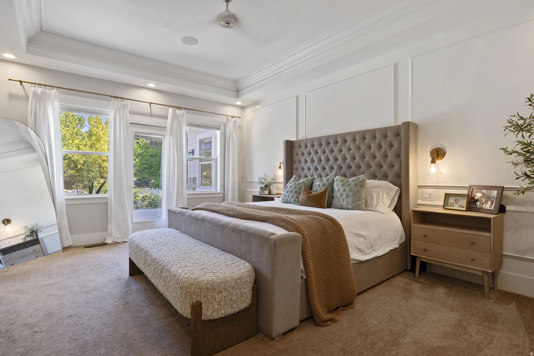 Primary bedroom with private entrance to the backyard paver patio