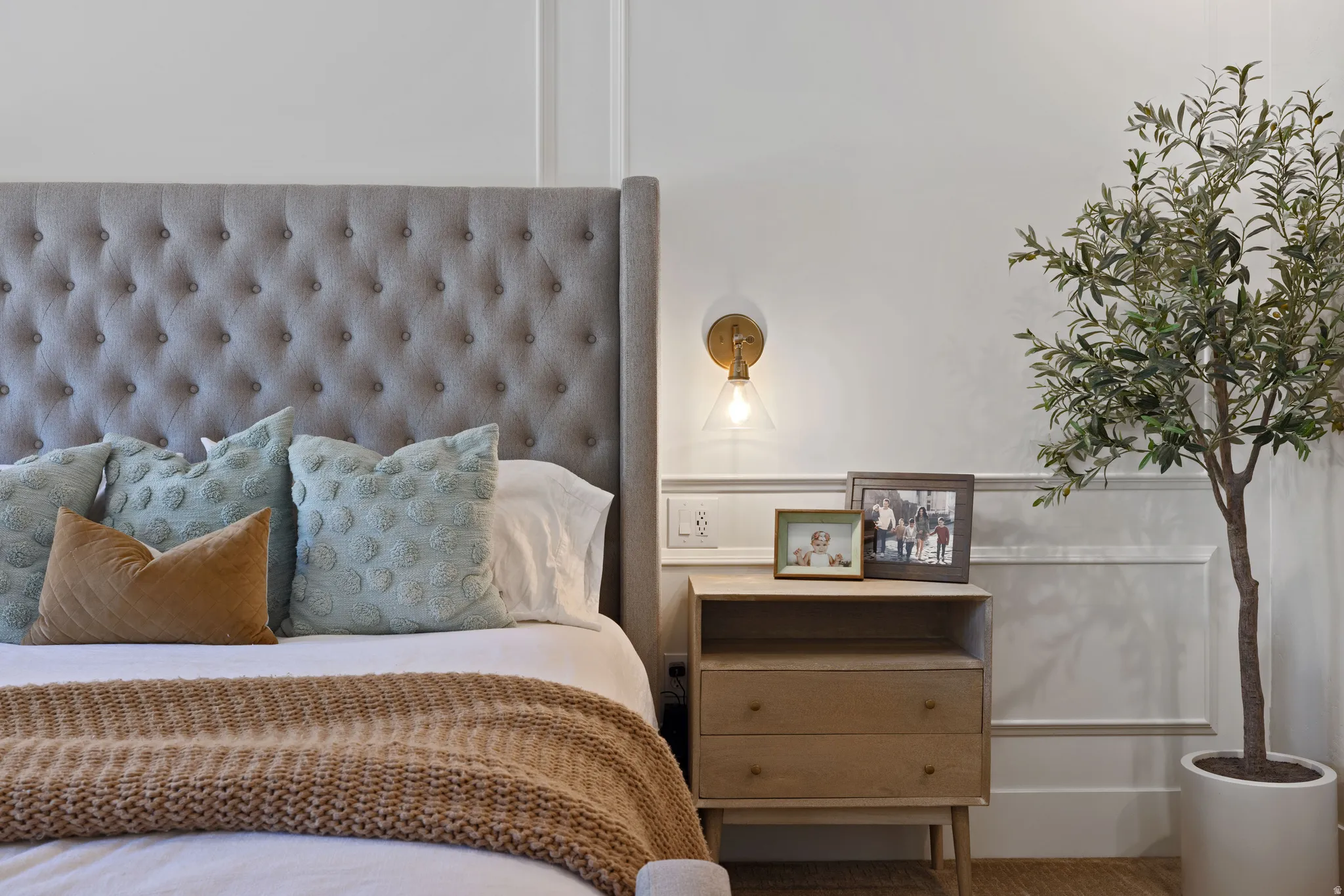 Wall paneling accentuates the light-toned walls