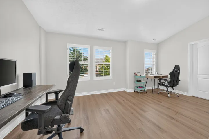 Extra large 2nd bedroom upstairs featuring a large walk-in closet