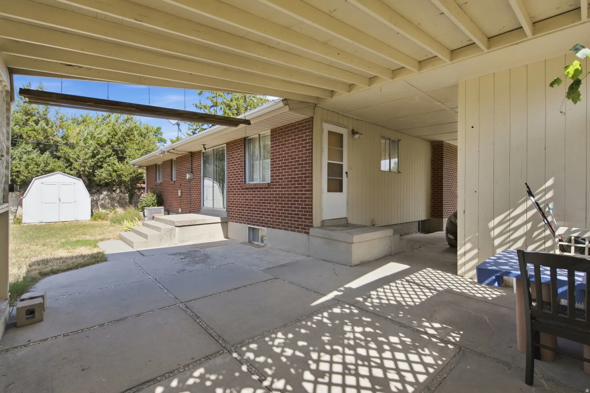 Covered patio with concrete flooring