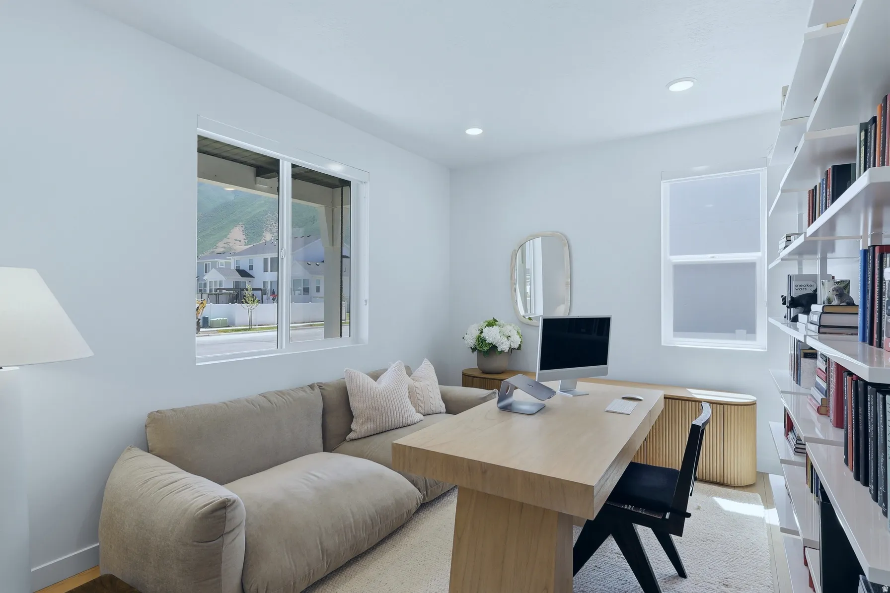 Bright interior space featuring light wood-finish flooring