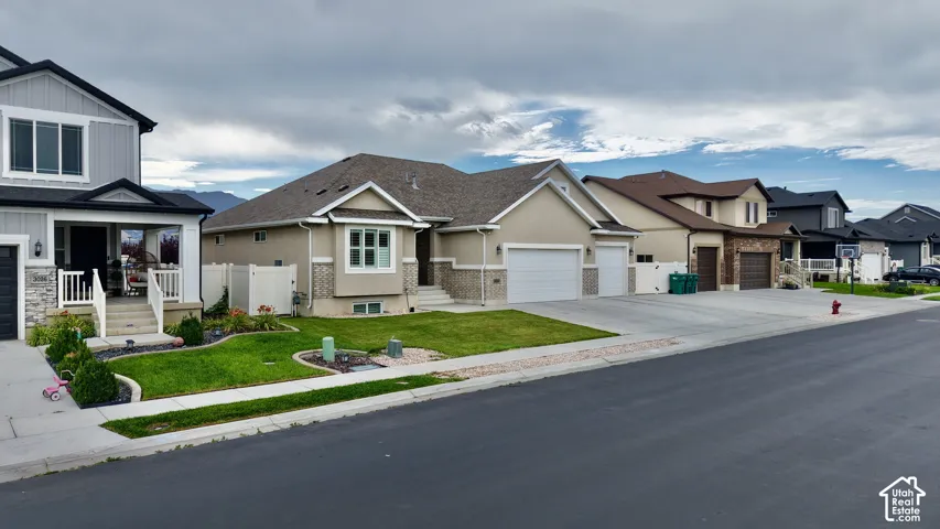 Contemporary stucco exterior with stone accents