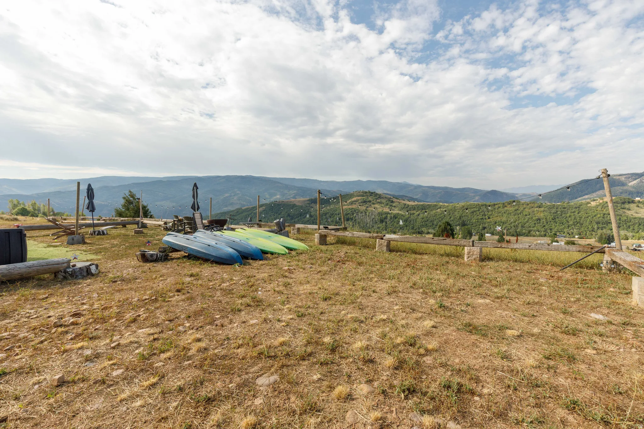 Expansive mountain landscape with a partial property perimeter visible