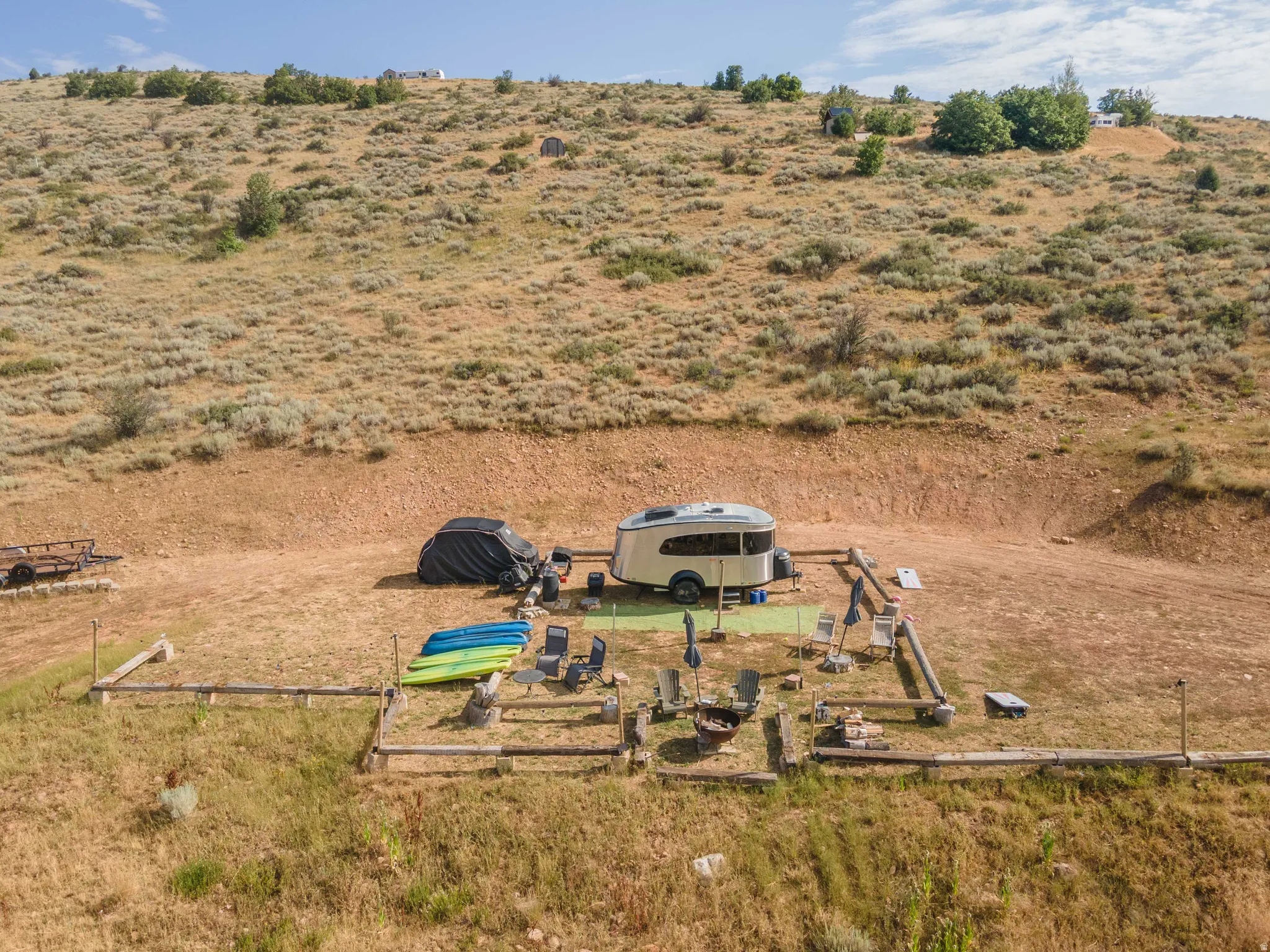 Outdoor recreational property featuring a graded level pad