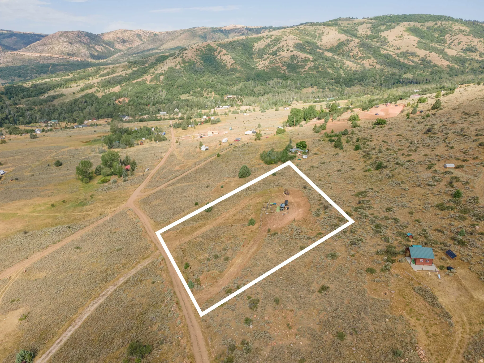 Expansive undeveloped land parcel with marked boundaries