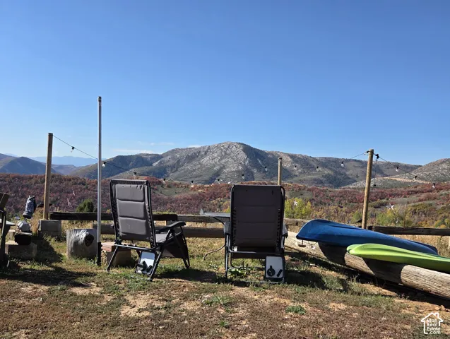 Mountain backdrop with expansive natural landscaping