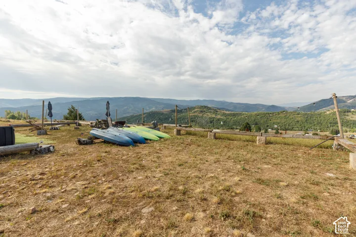 Expansive mountain landscape with a partial property perimeter visible