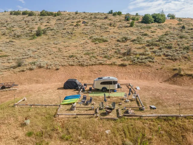 Outdoor recreational property featuring a graded level pad