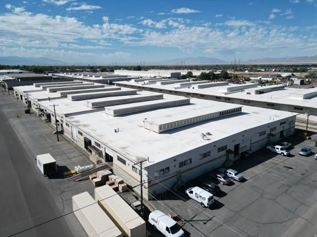 Expansive commercial complex featuring multiple industrial buildings with extensive rooflines