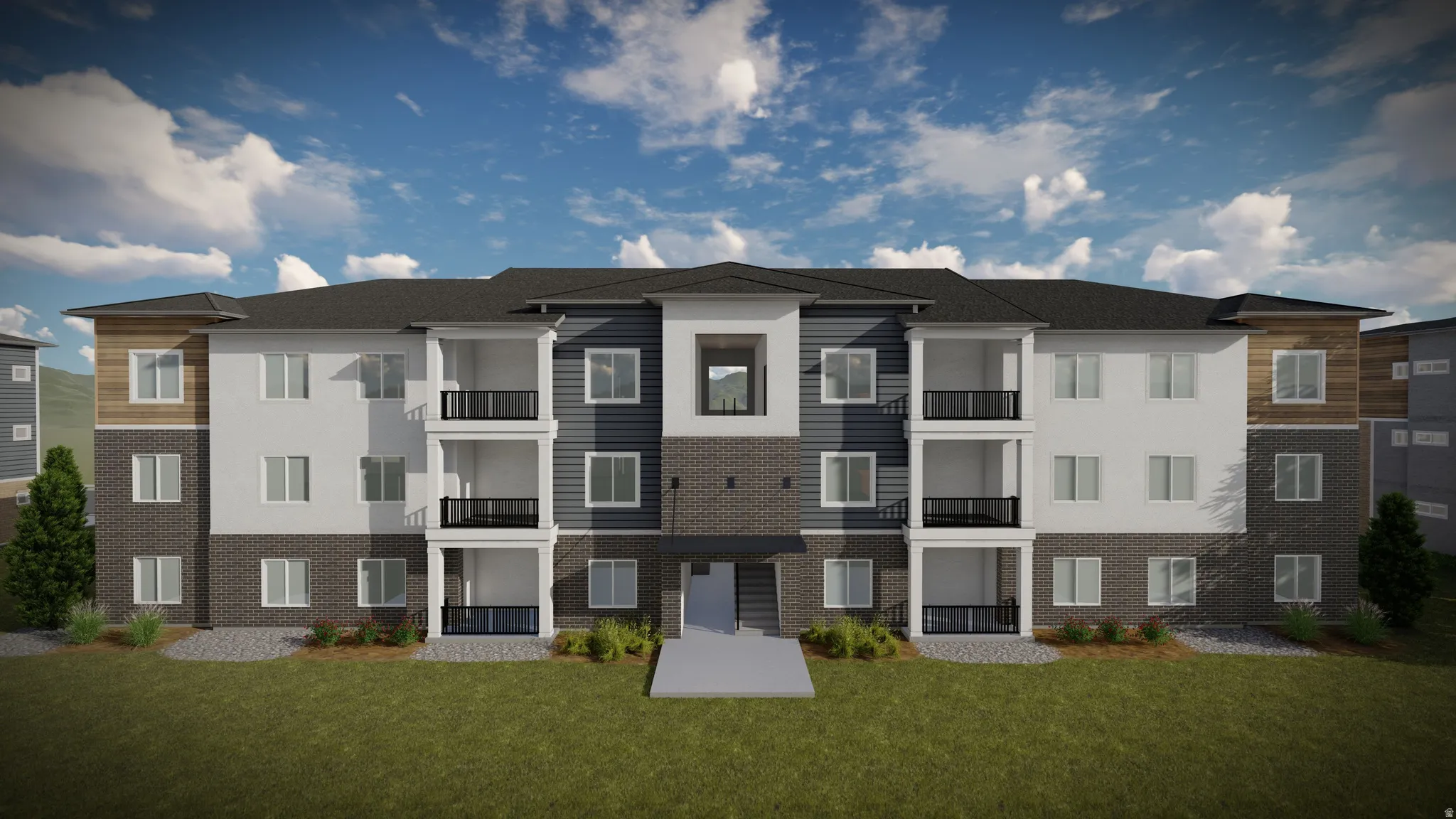 Multi-story building featuring a facade of dark brick, light siding, and wood-panel accents
