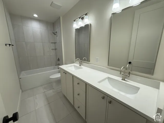 Dual vanity with integrated sinks and brushed nickel faucets