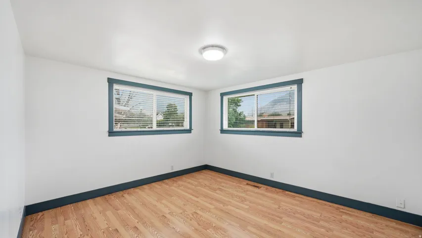 Bright interior space featuring light wood-finish flooring