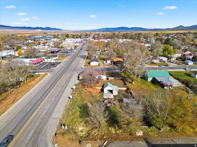 Aerial perspective showcasing a developed area with a prominent multi-lane road