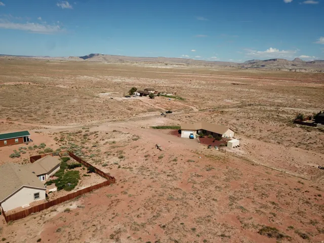 Expansive desert landscape with multiple residential properties