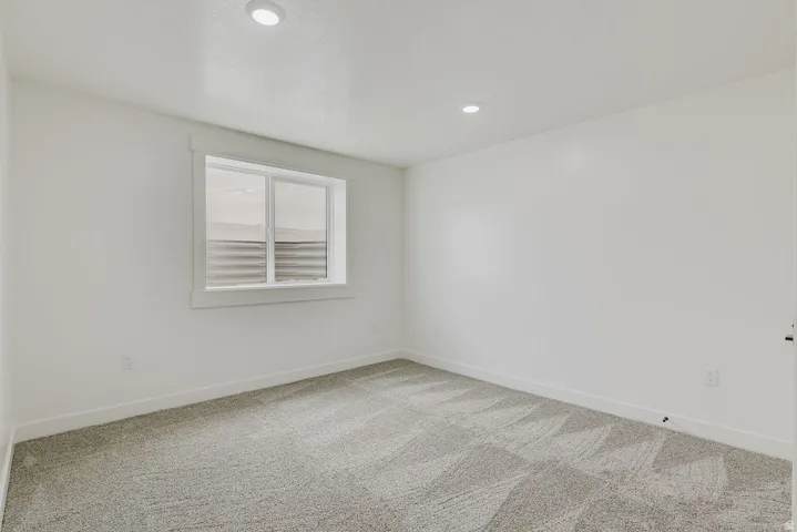 ADU Bedroom allowing good light into the room as the ground is only half way up the window.