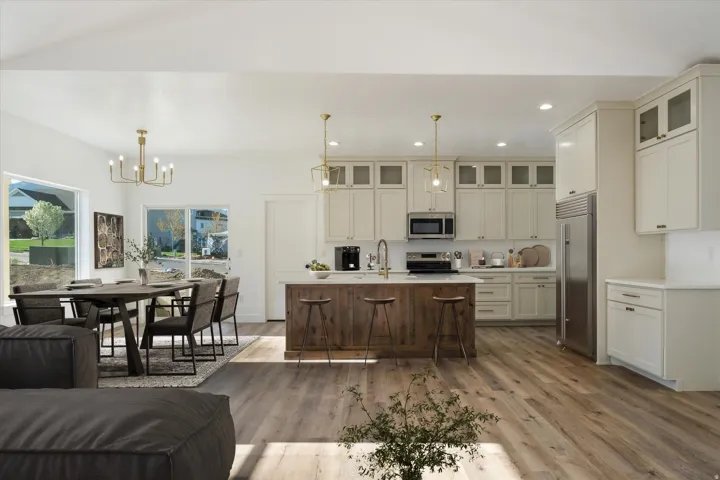 Ai Generated Staging Open-concept kitchen and dining area featuring wood-finish flooring