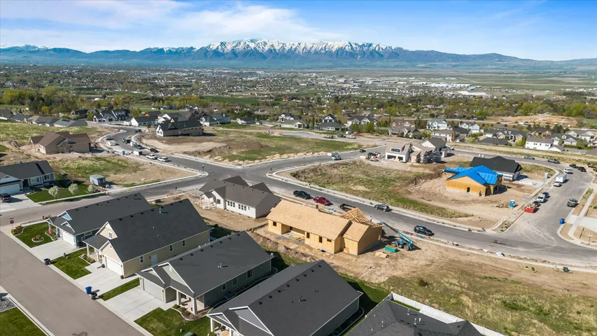 New construction development featuring a variety of home styles and building stages