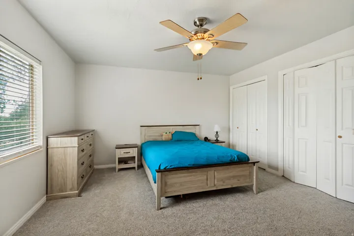Neutral tone carpeting throughout
