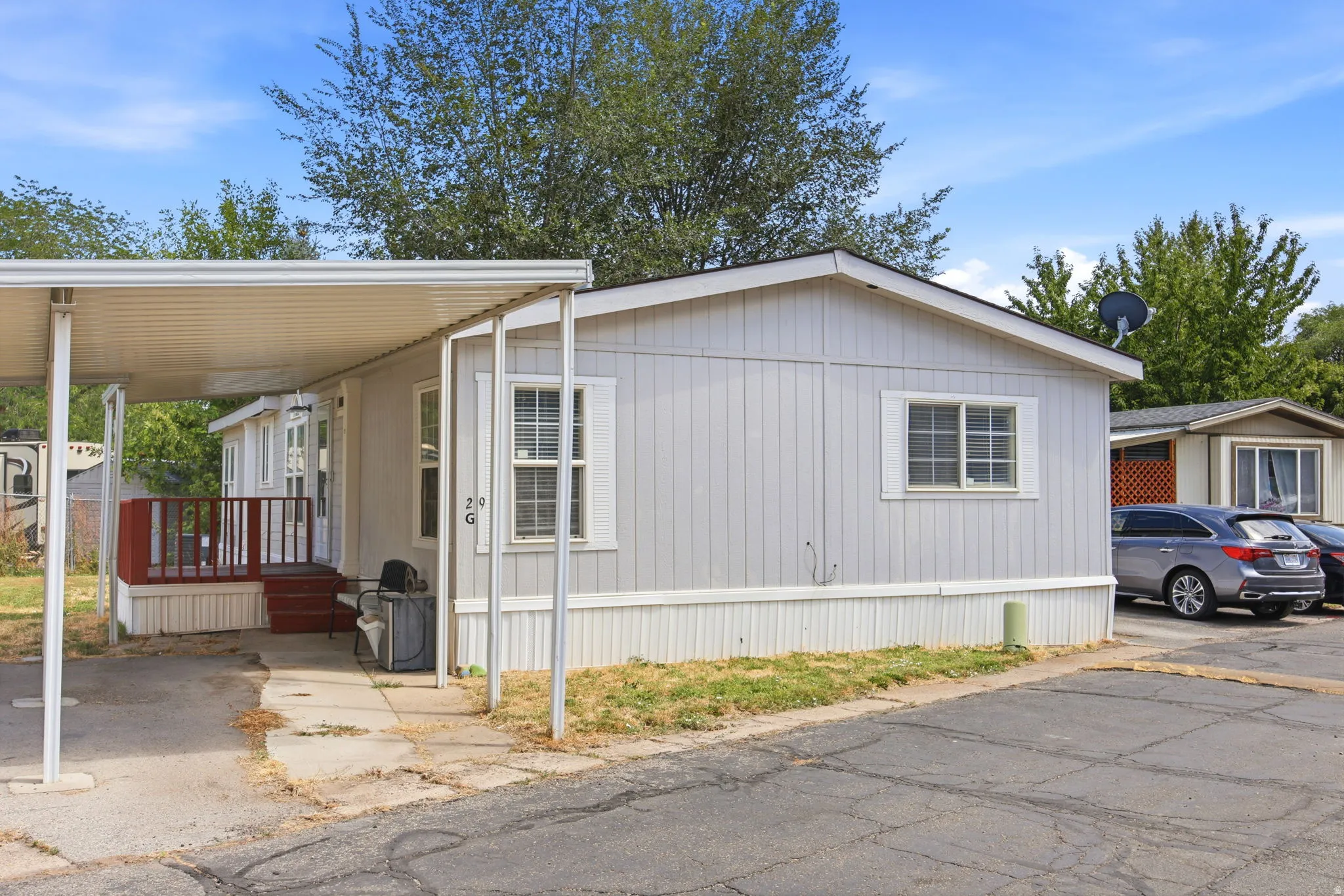 Light gray exterior siding with white trim