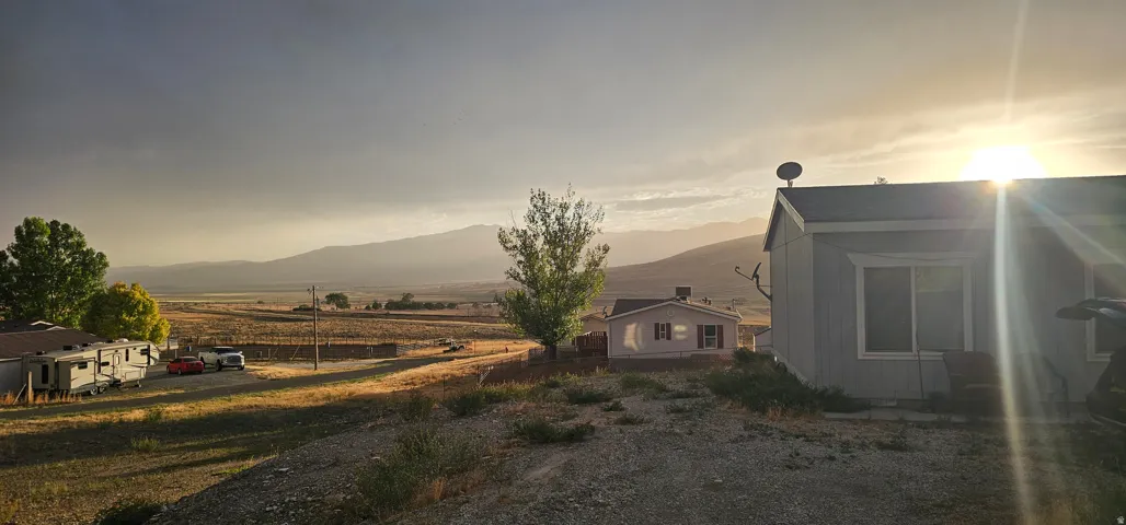 Expansive rural landscape with distant mountains