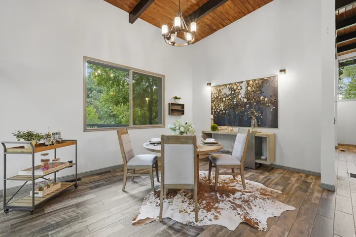 Vaulted wood-paneled ceiling with exposed beams