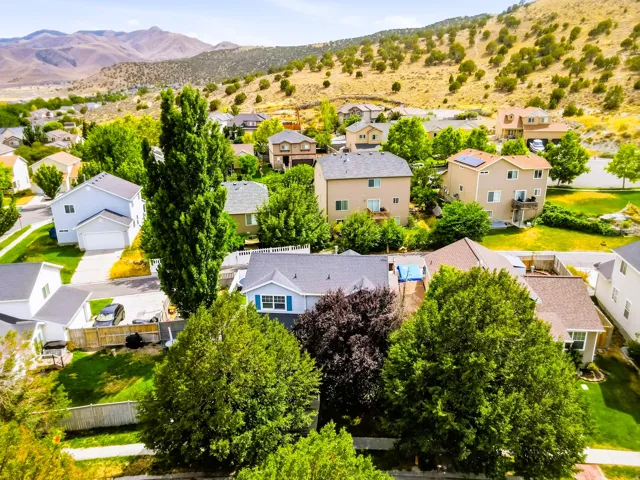 Aerial view of house and mountain views