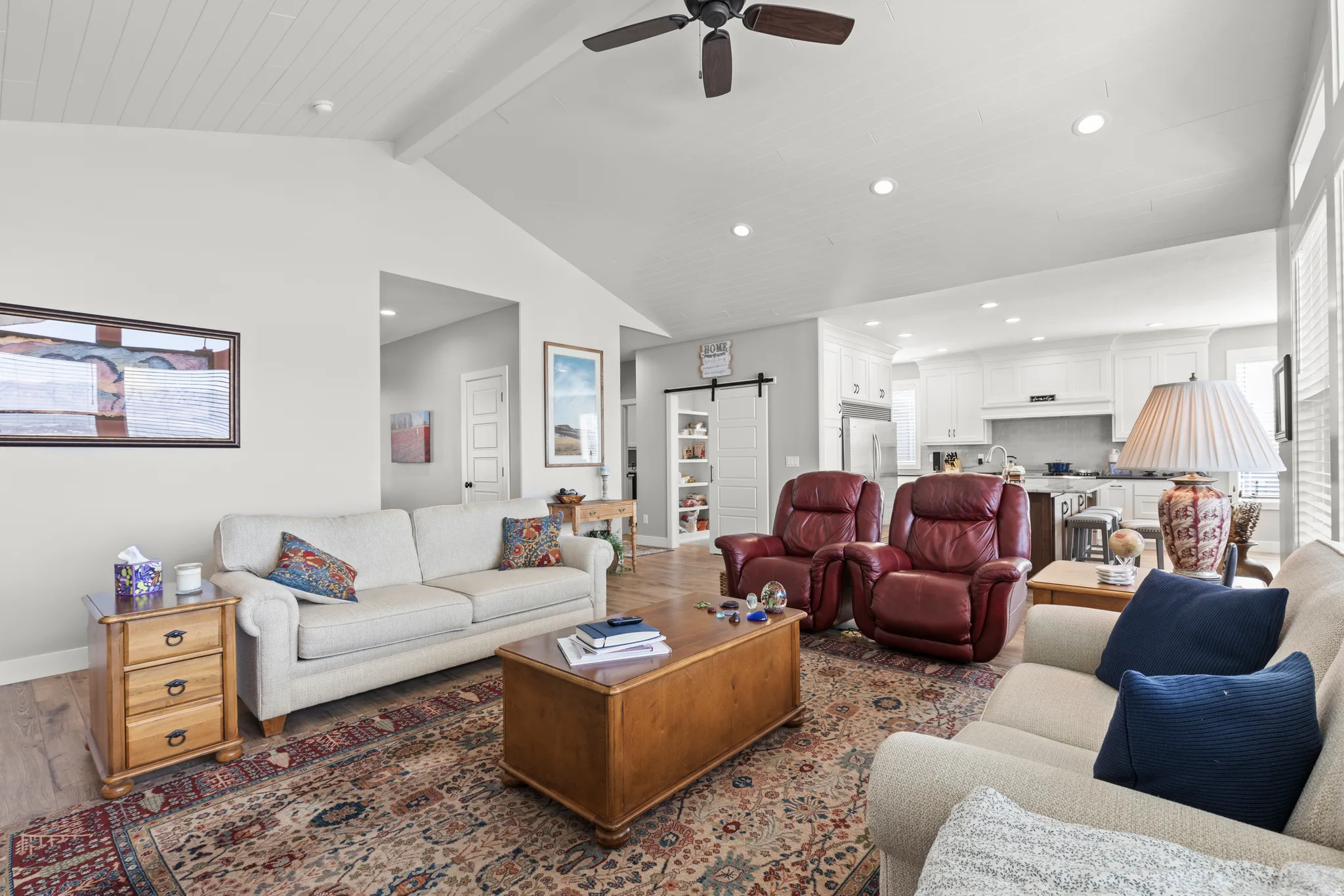 Vaulted ceiling with wood-finish planks and exposed beams