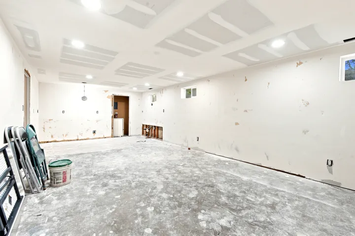 Unfinished interior space featuring recessed lighting, multiple windows providing natural light, and an open layout