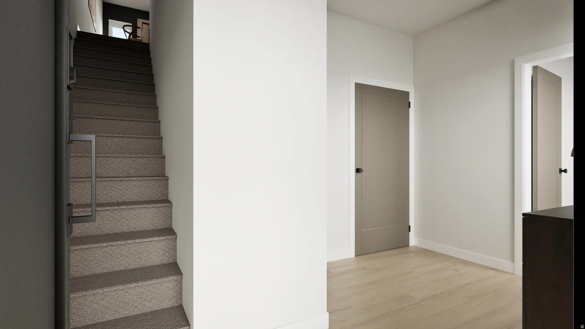 Light wood-finish flooring complements white walls and modern interior doors