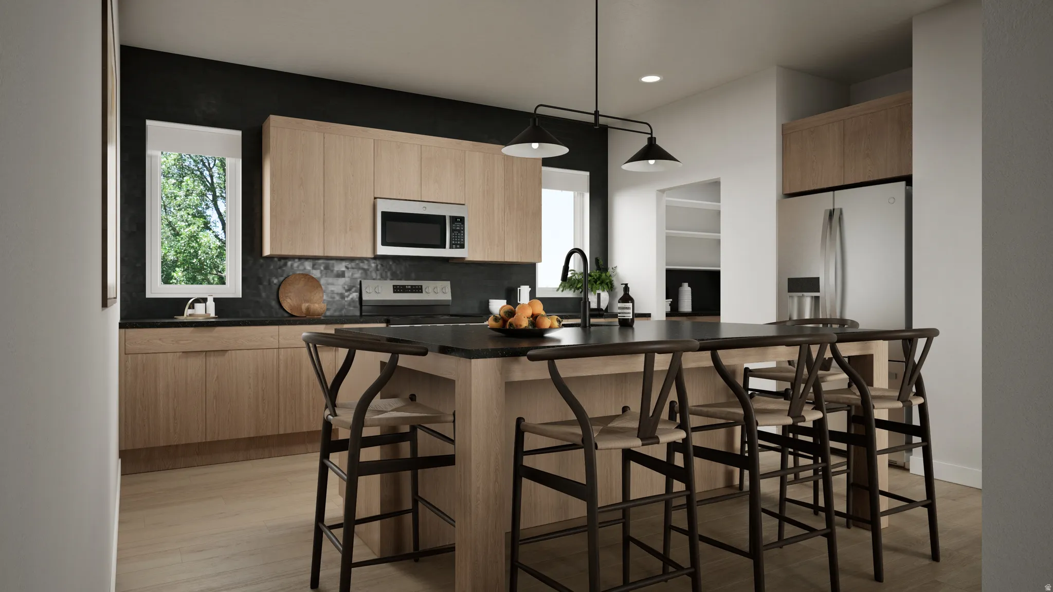 Modern kitchen featuring a large central island with seating, stainless steel appliances, wood-finish cabinetry, and a dark tile backsplash