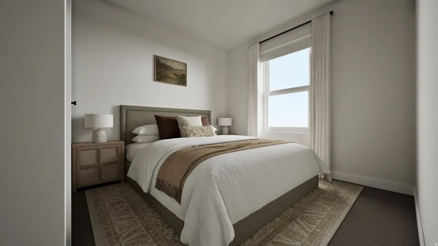 Bright interior space featuring a double window with white trim, dark rod, and sheer curtains