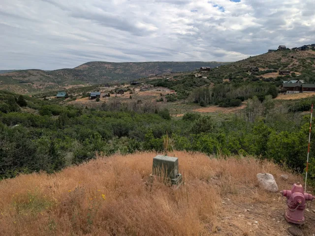 Rolling hills and valleys featuring abundant natural vegetation