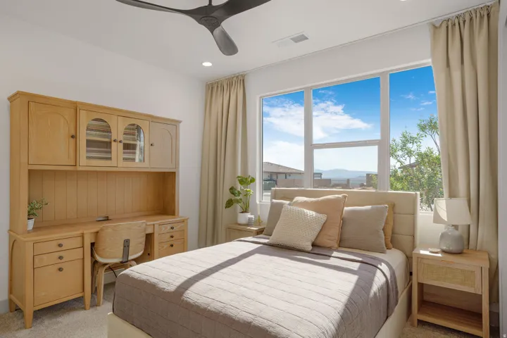 Bedroom featuring large windows, a ceiling fan, recessed lighting, and light-colored curtains