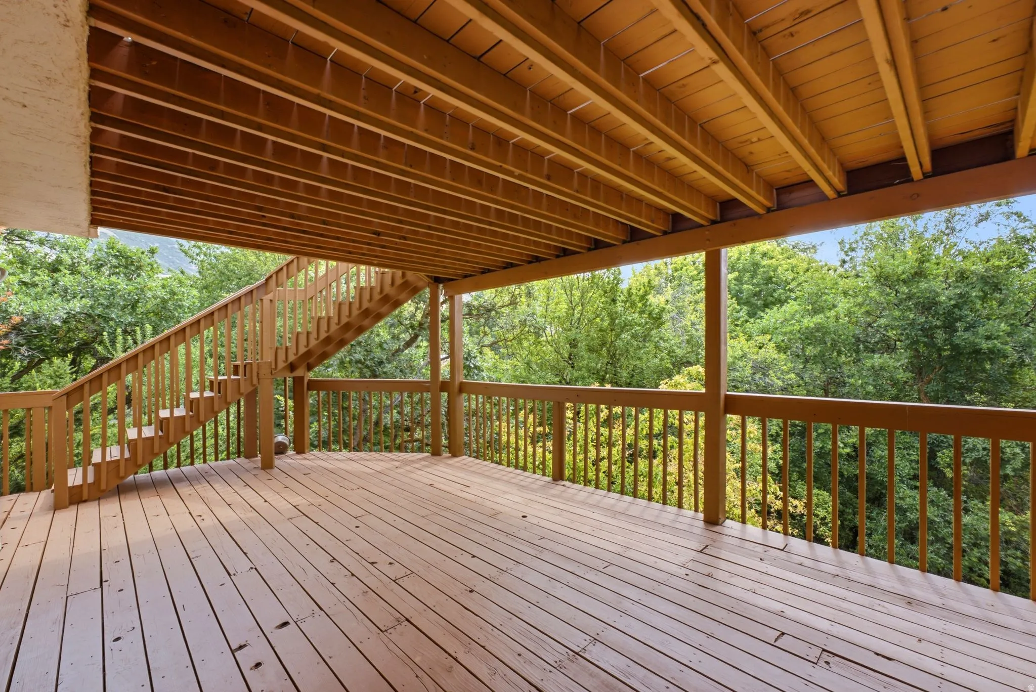 Expansive wood deck with a full railing system