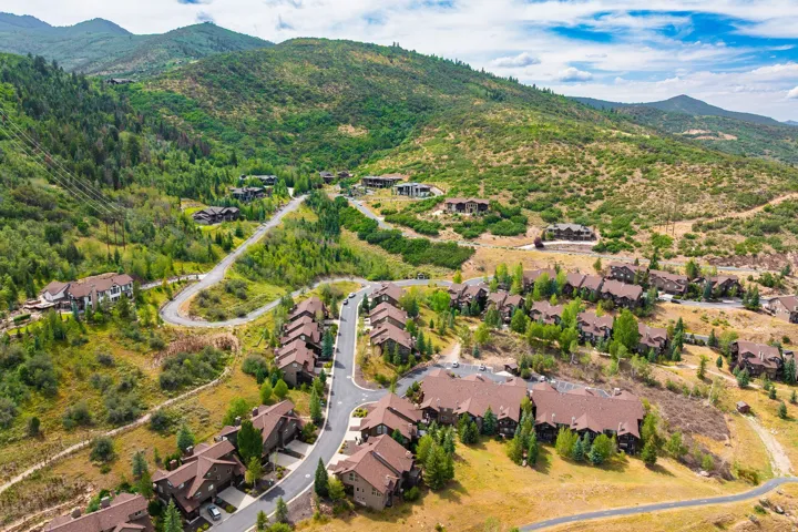 Mountainous terrain surrounding residential properties